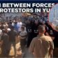 Benturan antara pasukan dan protestor di Yunnan