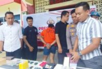 Pelaku yang baju oranye saat Press release