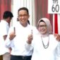 Acungkan Jari Satu, Anies Mencoblos di TPS 060