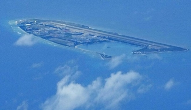 China Bangun Pulau Baru di LCS (Foto : AP/Aaron Favila)
