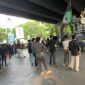 Ratusan mahasiswa PTKP Badko HMI Sulselbar menggelar aksi unjuk rasa di Jalan Alauddin dan Fly Over Makassar.