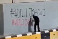Coretan Dinding Tagar #AdiliJokowi Semakin Menguat