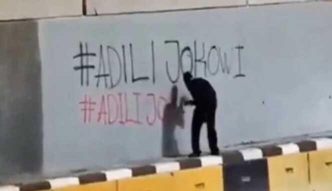 Coretan Dinding Tagar #AdiliJokowi Semakin Menguat