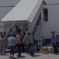 Video Amatir Oknum Polisi Menampar Emak-emak di Pelabuhan Soekarno-Hatta Makassar (Tangkapan Layar)