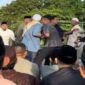 Panitia dan Jemaah nyaris bentrok (Foto tangkapan layar video netizen di media sosial)