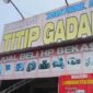 Papan nama CV Irsan Group - Irsan Phone 01 yang bergerak di bidang titip gadai dan jual beli HP bekas di Kabupaten Gowa.