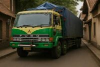 Foto ilustrasi - Truk 10 roda pengangkut barang masuk ke lorong-lorong di Makassar.