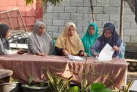 Penandatanganan nota kesepahaman (MoU) antara SD Negeri Parinring Makassar dan Kelompok Wanita Tani (KWT) Permata Hijau.