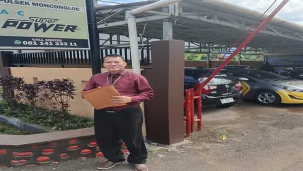 Pengacara BS K. Budi Simanungkalit saat di Polsek Moncong Loe