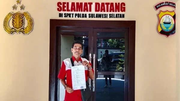 Budiman S saat selesai melapor di polda sulsel
