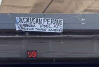 Spanduk “Undangan Perang Terbuka IPMIL ASU, Jangan Pulang Kampung” Terpajang di Fly Over Makassar