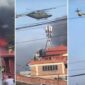 Tangkapan layar video – Rumah Presiden Nepal dikepung dan dibakar oleh massa, keluarga Presiden dievakuasi menggunakan helikopter.