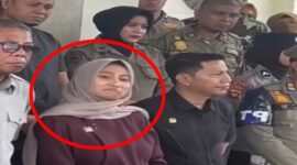 Tangkapan layar video - Ekspresi bibir menyungging Ketua Komisi III DPRD Kabupaten Gorontalo Utara (Gorut), Dheninda Chaerunnisa terekam kamera.