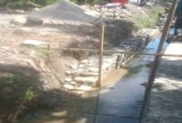 Proyek irigasi di Tana Lili, Kabupaten Luwu Utara, terlihat sedang dalam proses pembangunan.