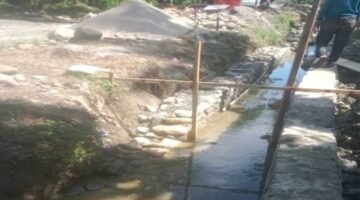 Proyek irigasi di Tana Lili, Kabupaten Luwu Utara, terlihat sedang dalam proses pembangunan.