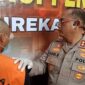 Kapolres Enrekang AKBP Hari Budiyanto saat memeriksa tersangka pembunuhan istri di Mapolres Enrekang. (Ist)