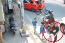Seorang perempuan berambut pirang (dilingkari merah) terlihat menggandeng seorang anak kecil, diduga Balita Bilqis (4), saat terekam CCTV di Jalan Pettarani, Makassar.