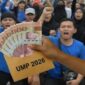 Ilustrasi uang rupiah dan buruh terkait pengumuman kenaikan UMP 2026 yang dinanti pekerja.