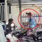Juru parkir liar yang diduga memungut tarif tinggi tanpa karcis terlihat dalam tangkapan layar video sebelum diamuk jemaah usai Salat Id di Makassar.