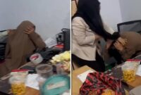 Tangkapan layar video menunjukkan istri sah melabrak wanita bercadar yang diduga selingkuhan suaminya di Makassar.