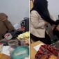 Tangkapan layar video menunjukkan istri sah melabrak wanita bercadar yang diduga selingkuhan suaminya di Makassar.