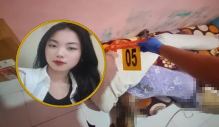 Petugas saat mengevakuasi jenazah Kirie Stephania Ronting dari kamar kosnya di Jalan Tidung Mariolo, Makassar.