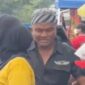 Tangkapan layar video oknum tukang bentor yang menyamar menjadi jukir liar di lokasi CFD Jalan Boulevard, Makassar, Minggu (10/5/2026).