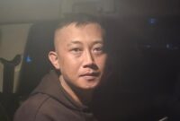 Tangkapan layar video detik-detik DPO Taufik Hidayat saat digiring polisi ke dalam mobil (Foto Ist)