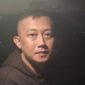 Tangkapan layar video detik-detik DPO Taufik Hidayat saat digiring polisi ke dalam mobil (Foto Ist)