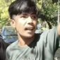 Tangkapa layar video pria diduga juru parkir liar saat terlibat adu mulut dengan pengendara mobil di Jalan Sungai Tangka, Makassar. Polisi masih memburu terduga pelaku.