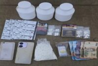 Barang bukti obat daftar G berlogo “Y” berupa tablet, Trihexyphenidyl, telepon seluler, kemasan, dan uang tunai.