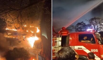 Petugas pemadam kebakaran berjibaku memadamkan kobaran api yang melanda kawasan Mall Nipah Makassar, Jalan Urip Sumoharjo, Minggu (9/8/2026) malam. (Foto kolase/tangkapan layar video)