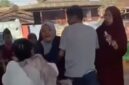 Tangkapan layar video memperlihatkan seorang guru berhijab dijambak dan diserang sejumlah orang tua murid di lingkungan sekolah, Jeneponto, Sulawesi Selatan.