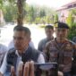 Kasubdit Tipidkor Ditreskrimsus Polda Sulsel, AKBP Jufri, didampingi Kasat Reskrim Polres Parepare, AKP Muh Saleh, usai rekonstruksi di Kantor Wali Kota Parepare.