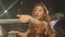 Tangkapan layar dari video viral yang merekam aksi pengemudi wanita berambut pirang saat diamankan setelah menyebabkan kecelakaan beruntun yang menewaskan seorang warga di Surabaya.