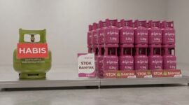 Ilustrasi perbandingan LPG 3 Kg dan gas pink non-subsidi (Bright Gas). (Visual AI). 