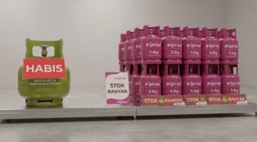 Ilustrasi perbandingan LPG 3 Kg dan gas pink non-subsidi (Bright Gas). (Visual AI).