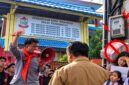 GMMPH mengecam rencana pungutan listrik kepada orang tua siswa SDN Mangkura 1, Makassar. (Visual AI)