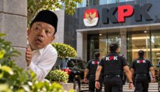 Ilustrasi Nusron Wahid ngumpet dari panggilan KPK (Visual AI)